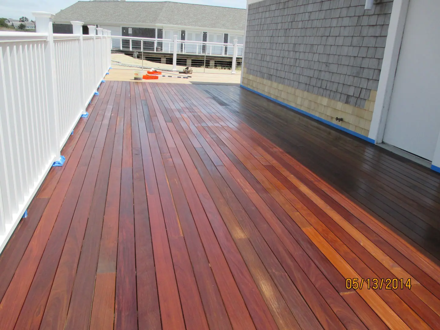 A deck that has been stained with wood stain.